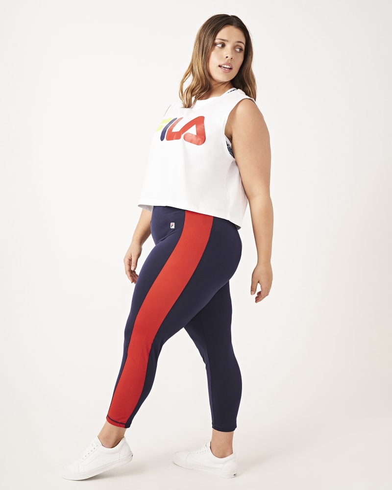 Plus size model with hourglass body shape wearing Anne Cropped Legging by FILA | Dia&Co | dia_product_style_image_id:160812